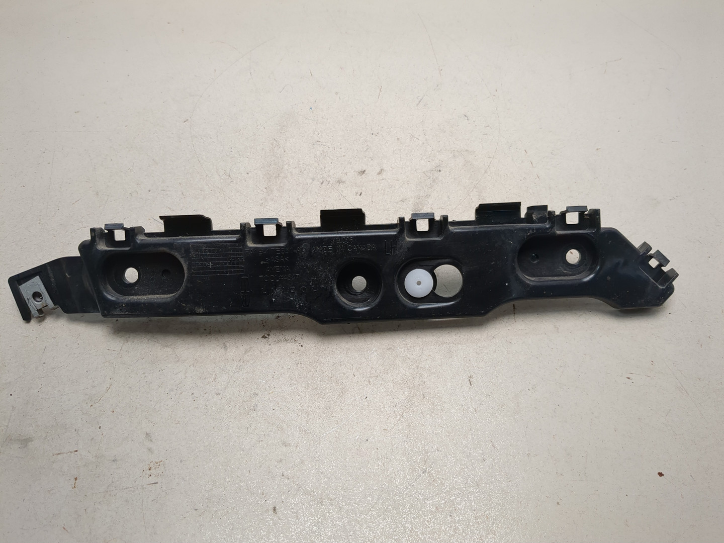 Кронштейн заднего бампера левый