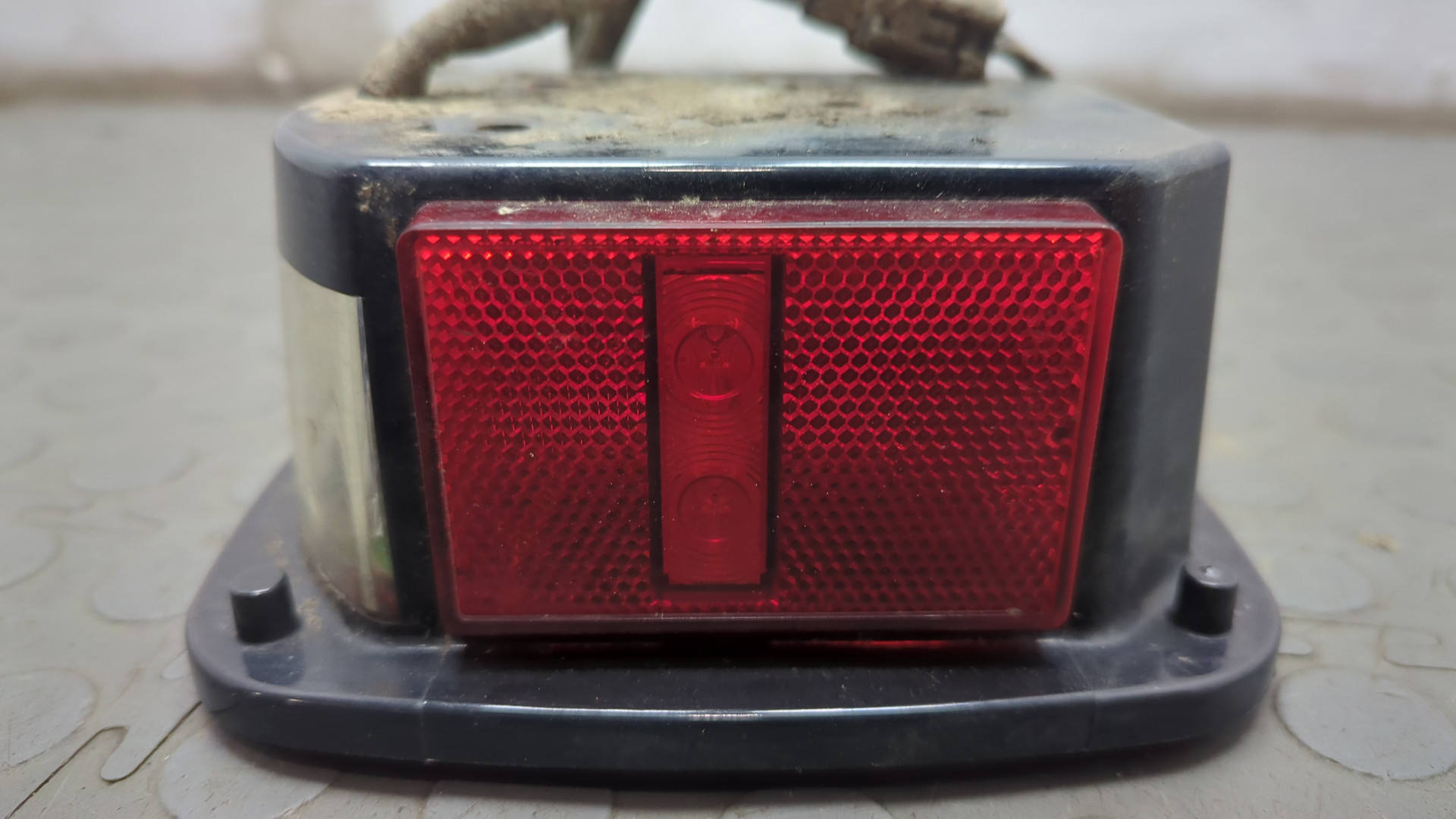 Фонарь задний левый