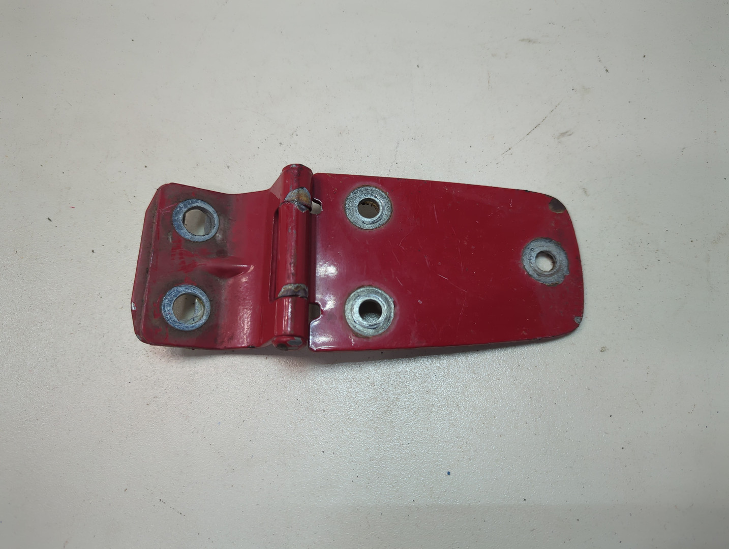 Петля капота