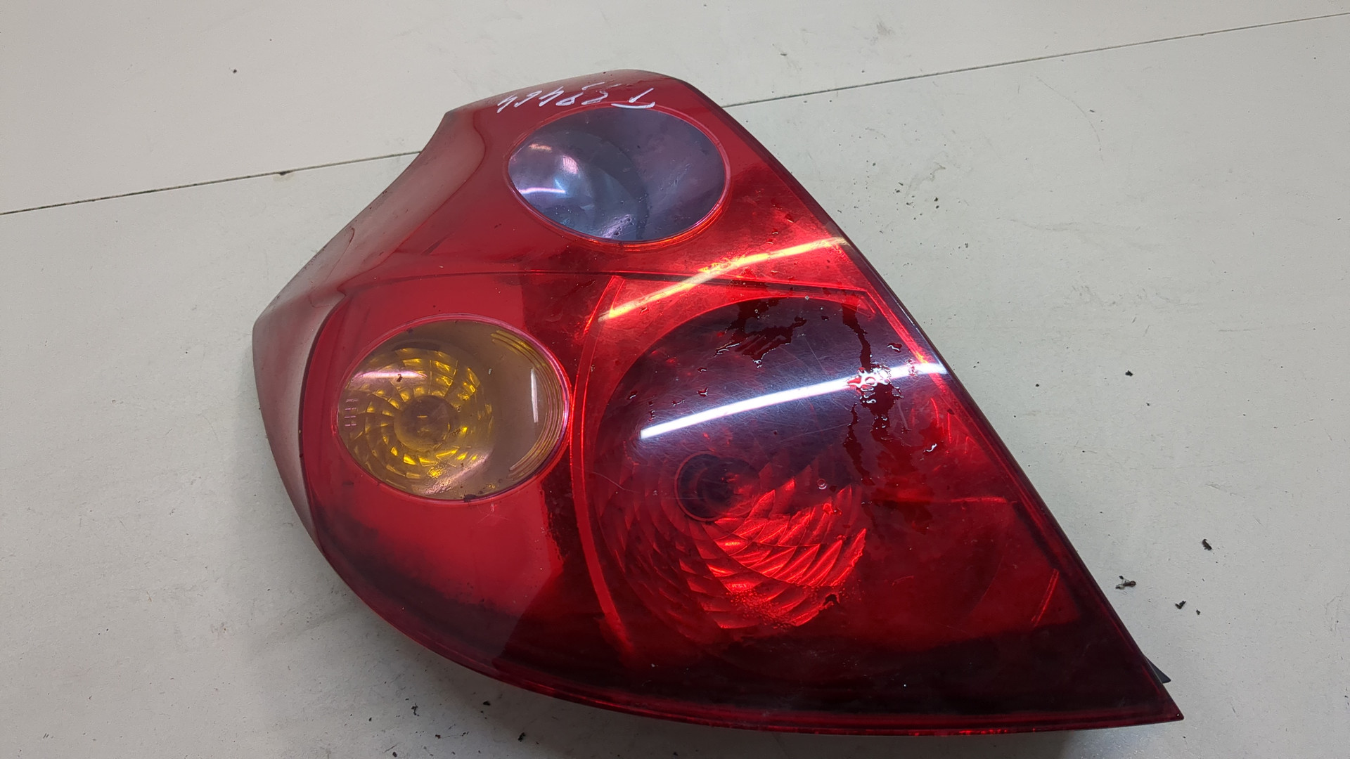 Фонарь задний левый