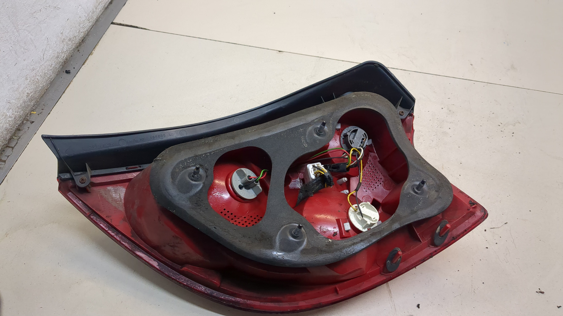 Фонарь задний левый