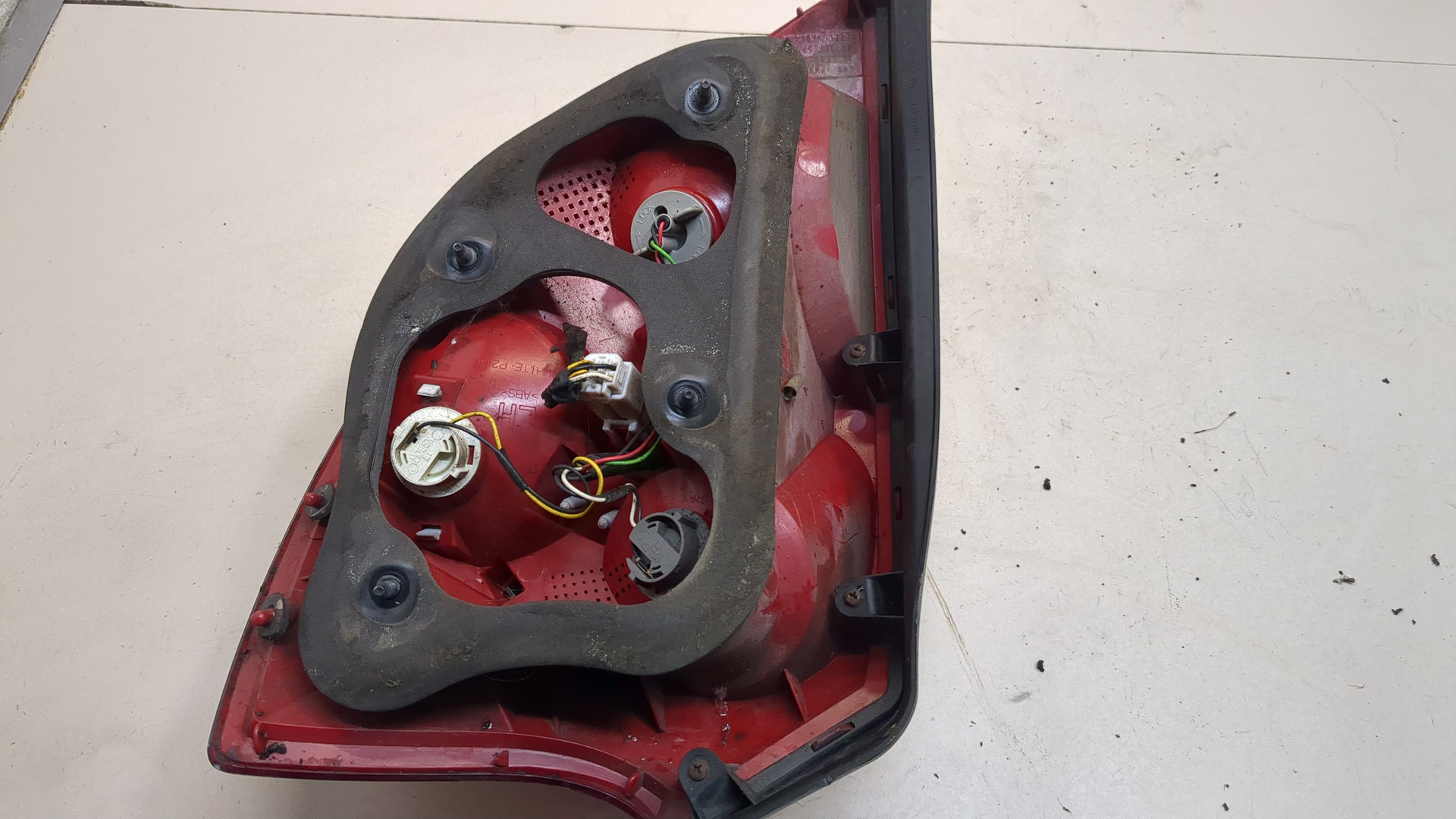 Фонарь задний левый