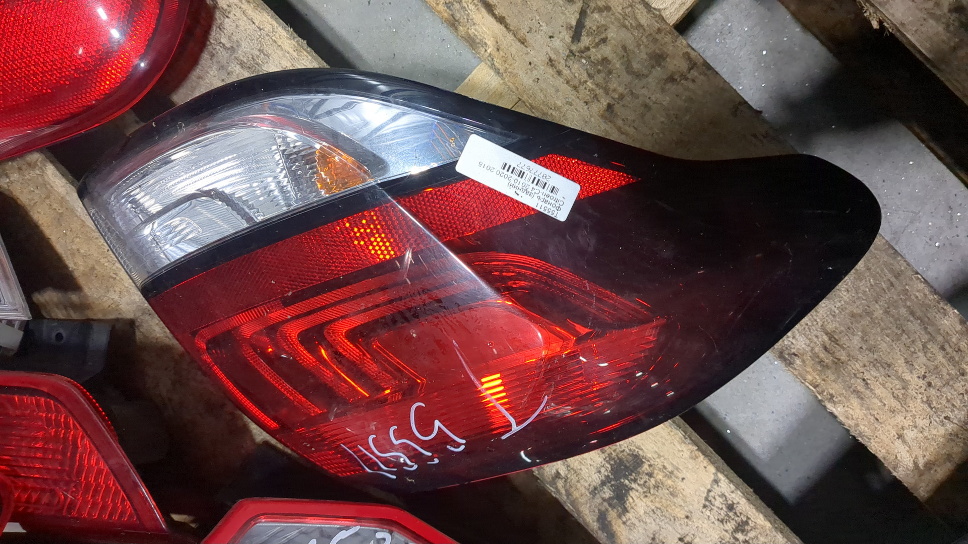 Фонарь задний левый