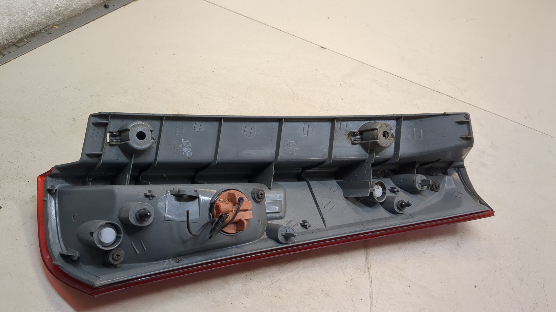 Фонарь задний левый