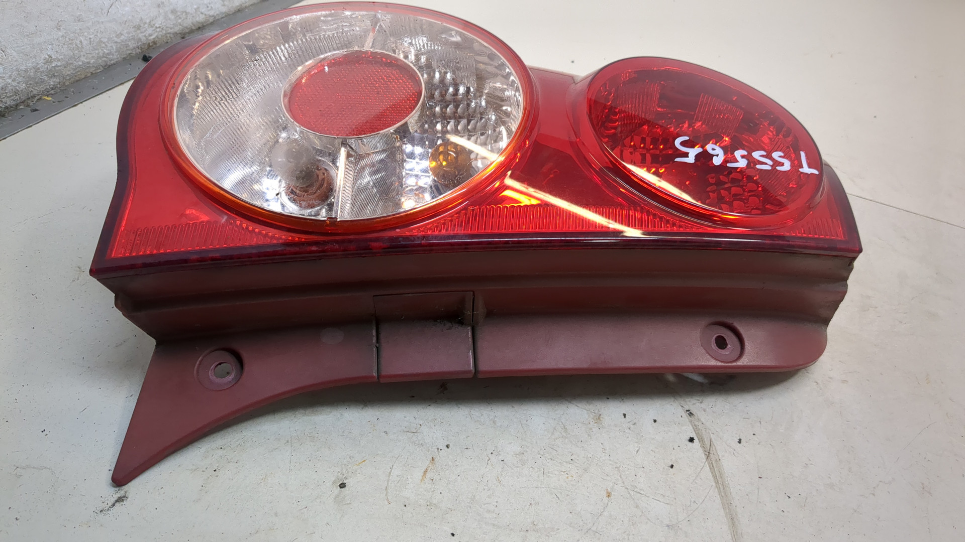 Фонарь задний левый