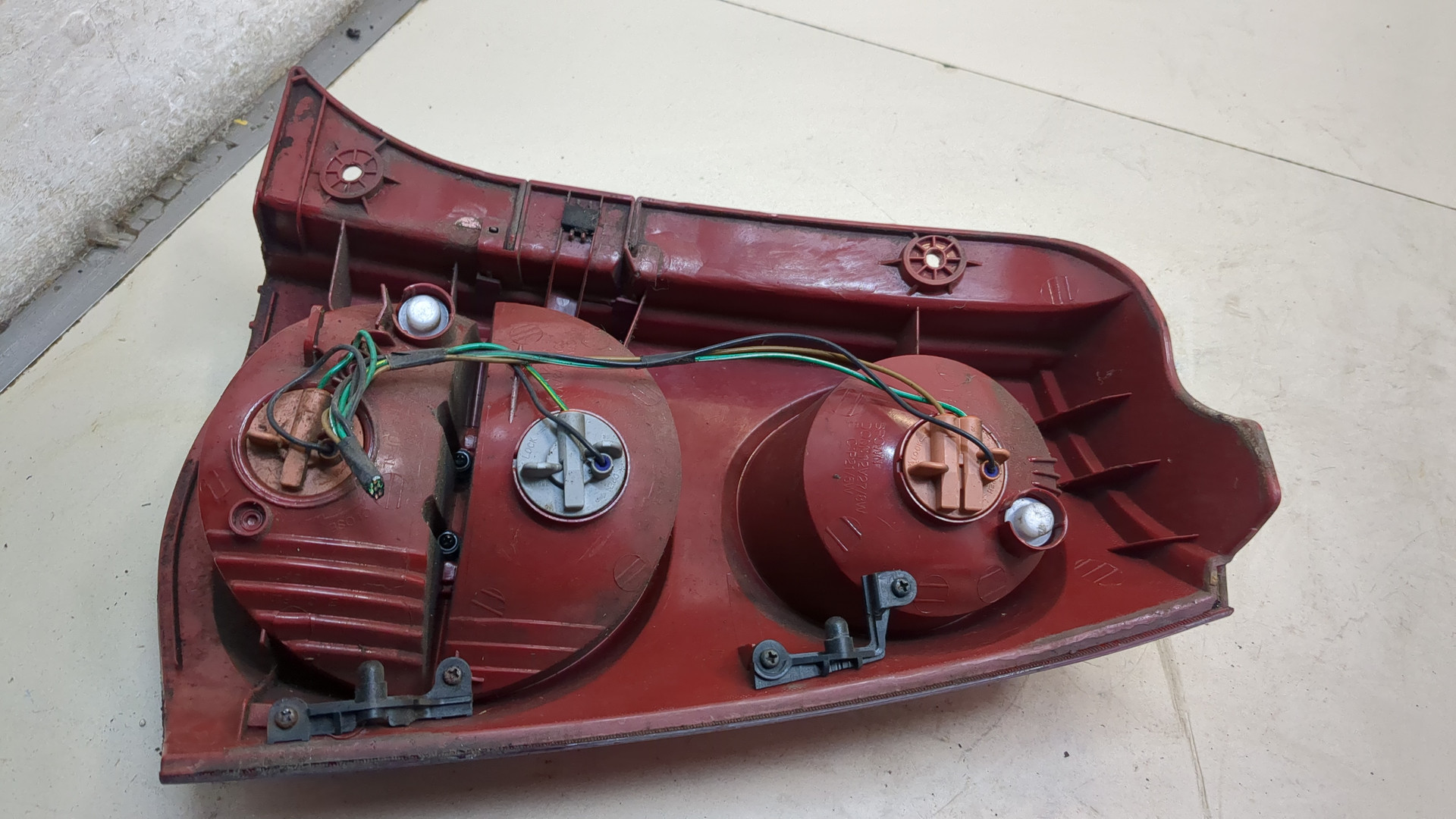 Фонарь задний левый