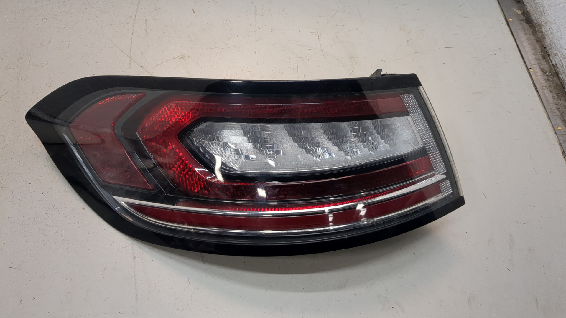 Фонарь задний левый