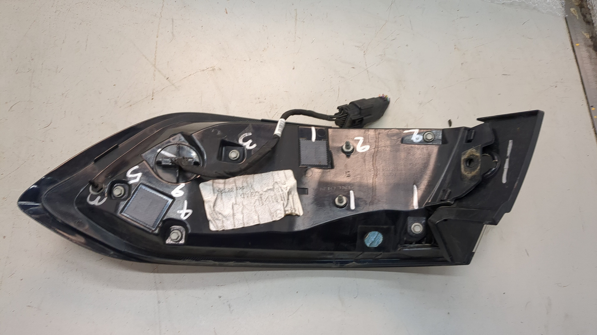 Фонарь задний левый