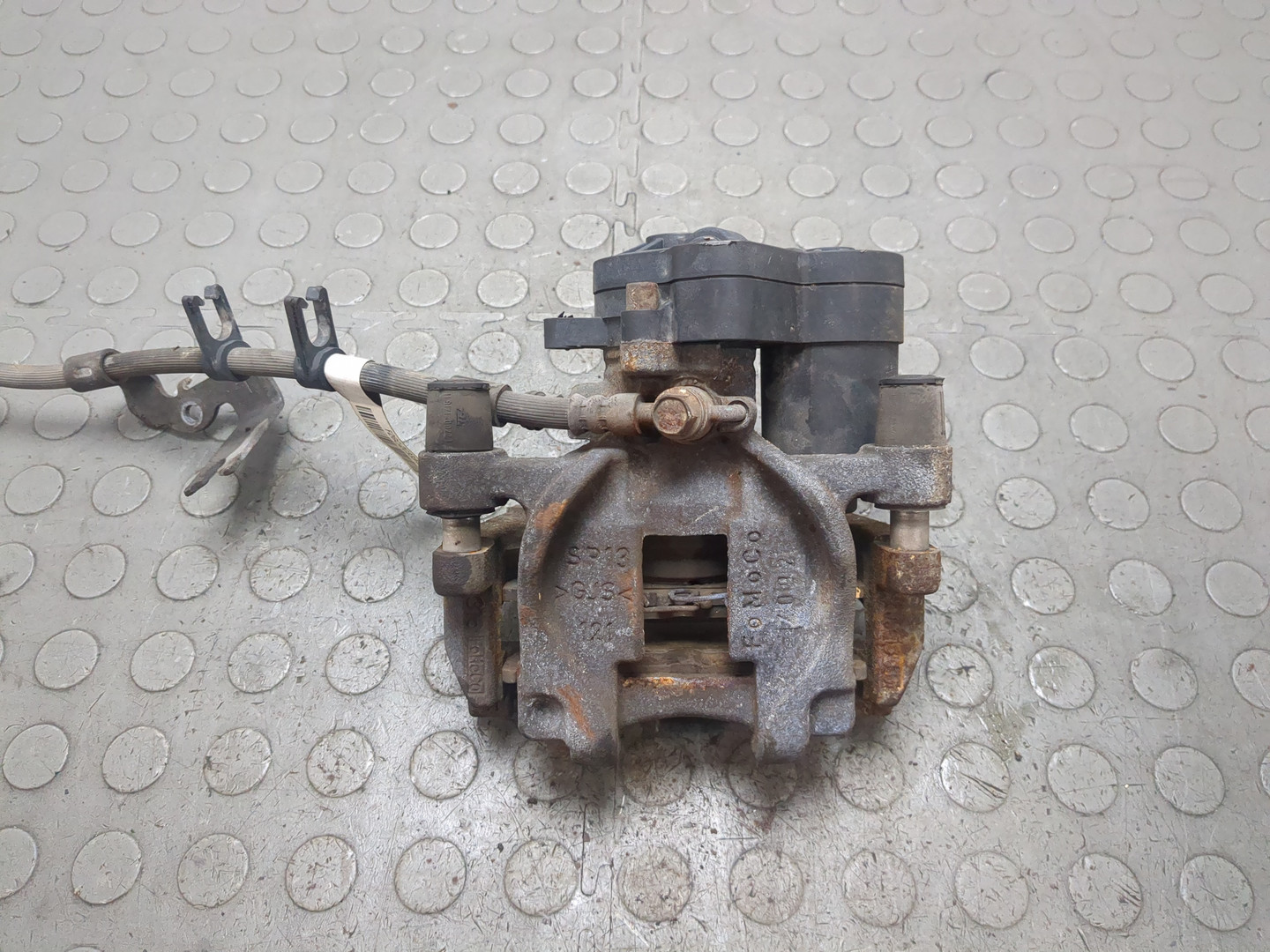 Суппорт задний левый