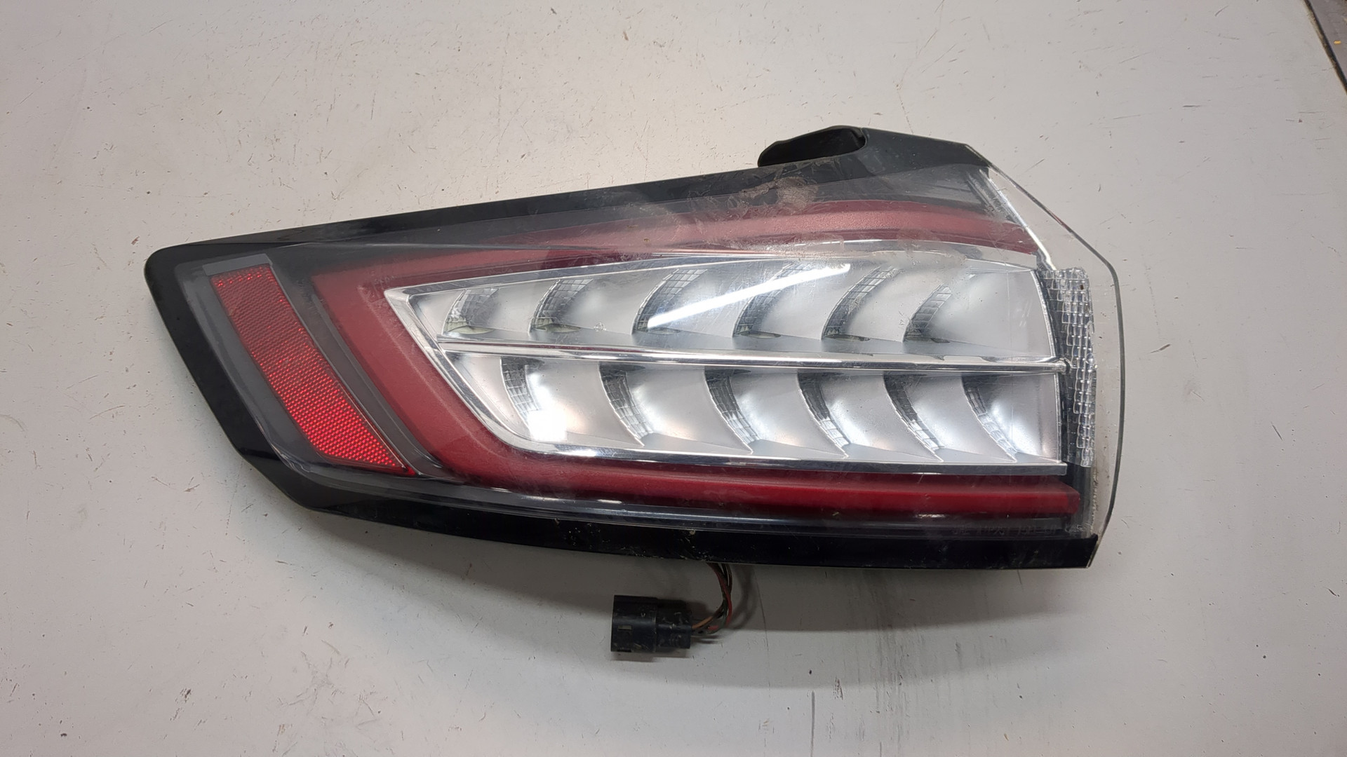 Фонарь задний левый