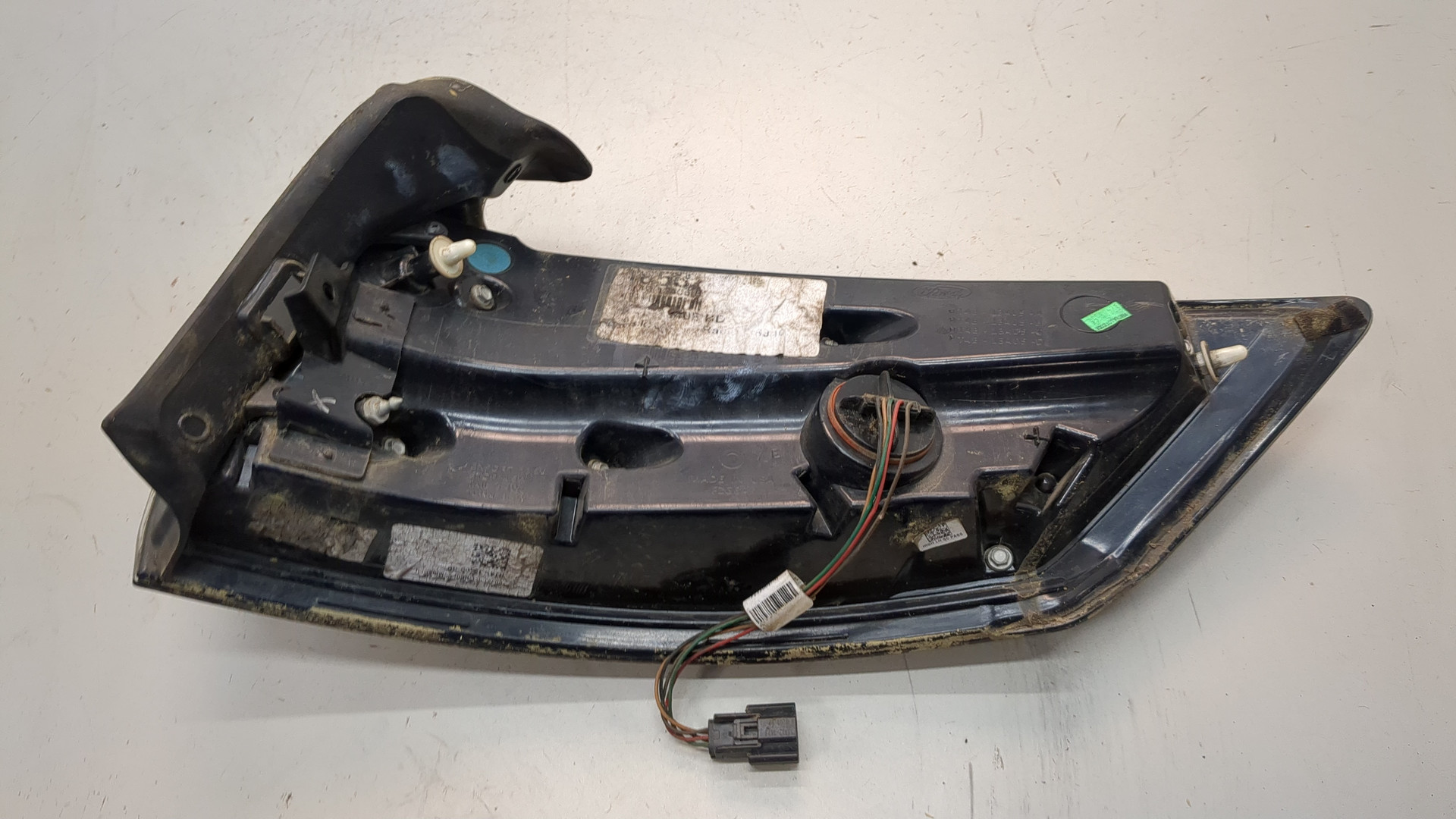 Фонарь задний левый