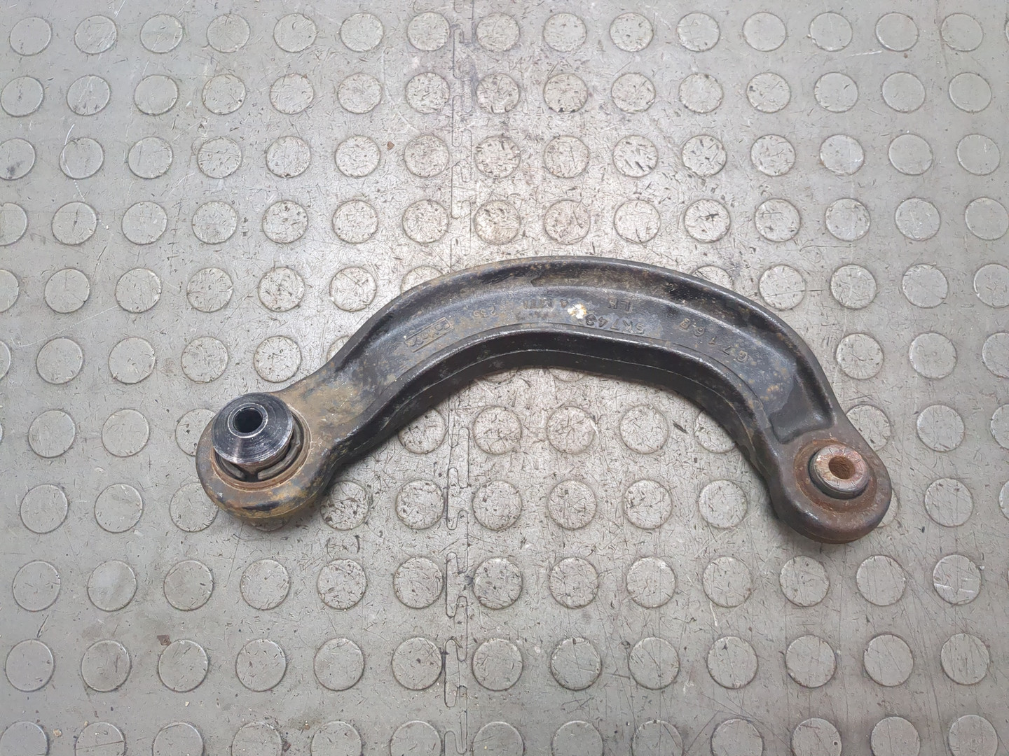 Рычаг задний левый