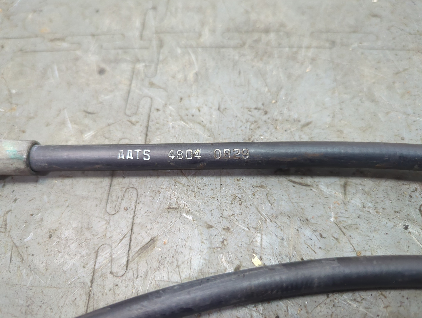 Трос стояночного тормоза