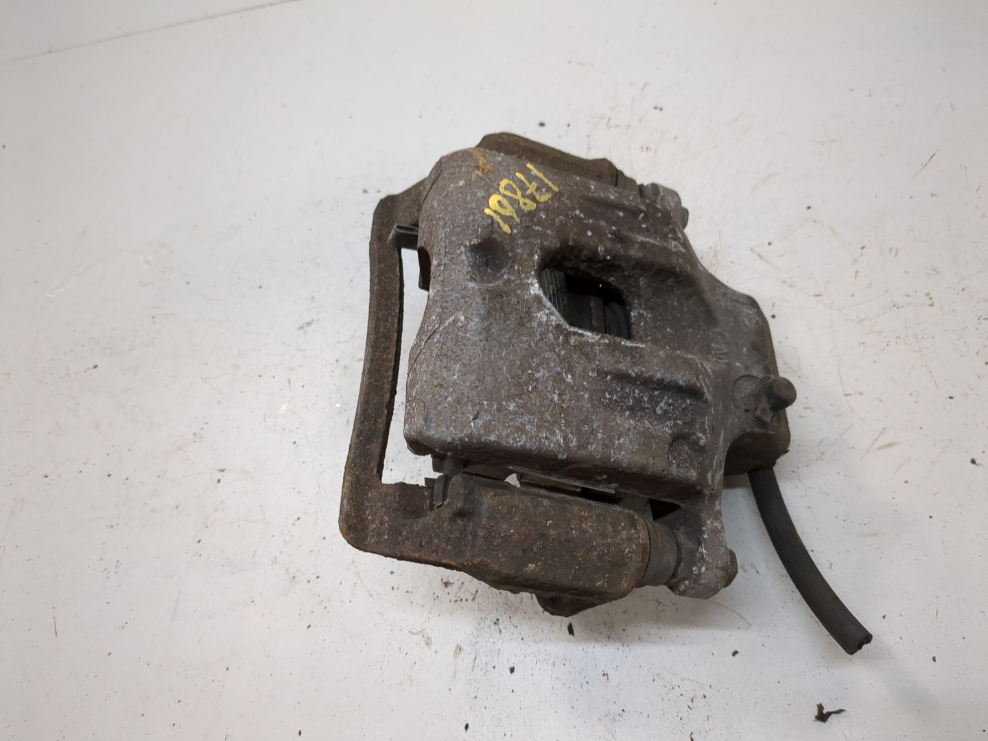 Суппорт задний левый