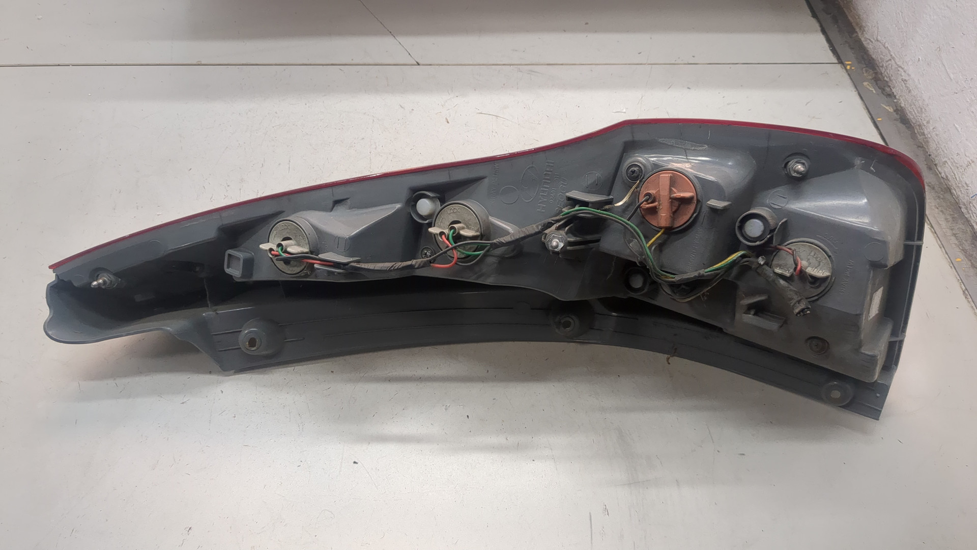 Фонарь задний левый