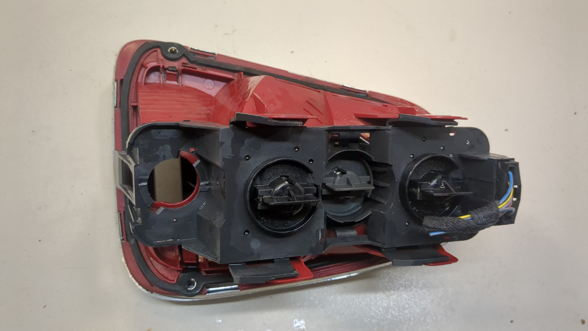 Фонарь задний левый