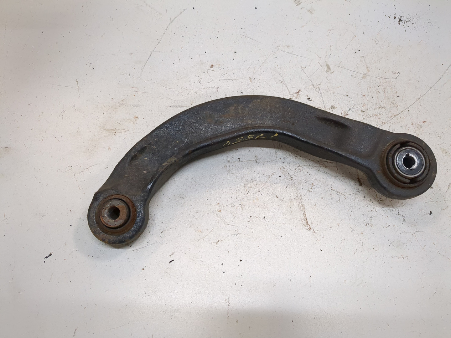 Рычаг задний левый