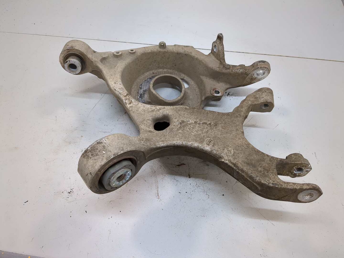 Рычаг задний левый