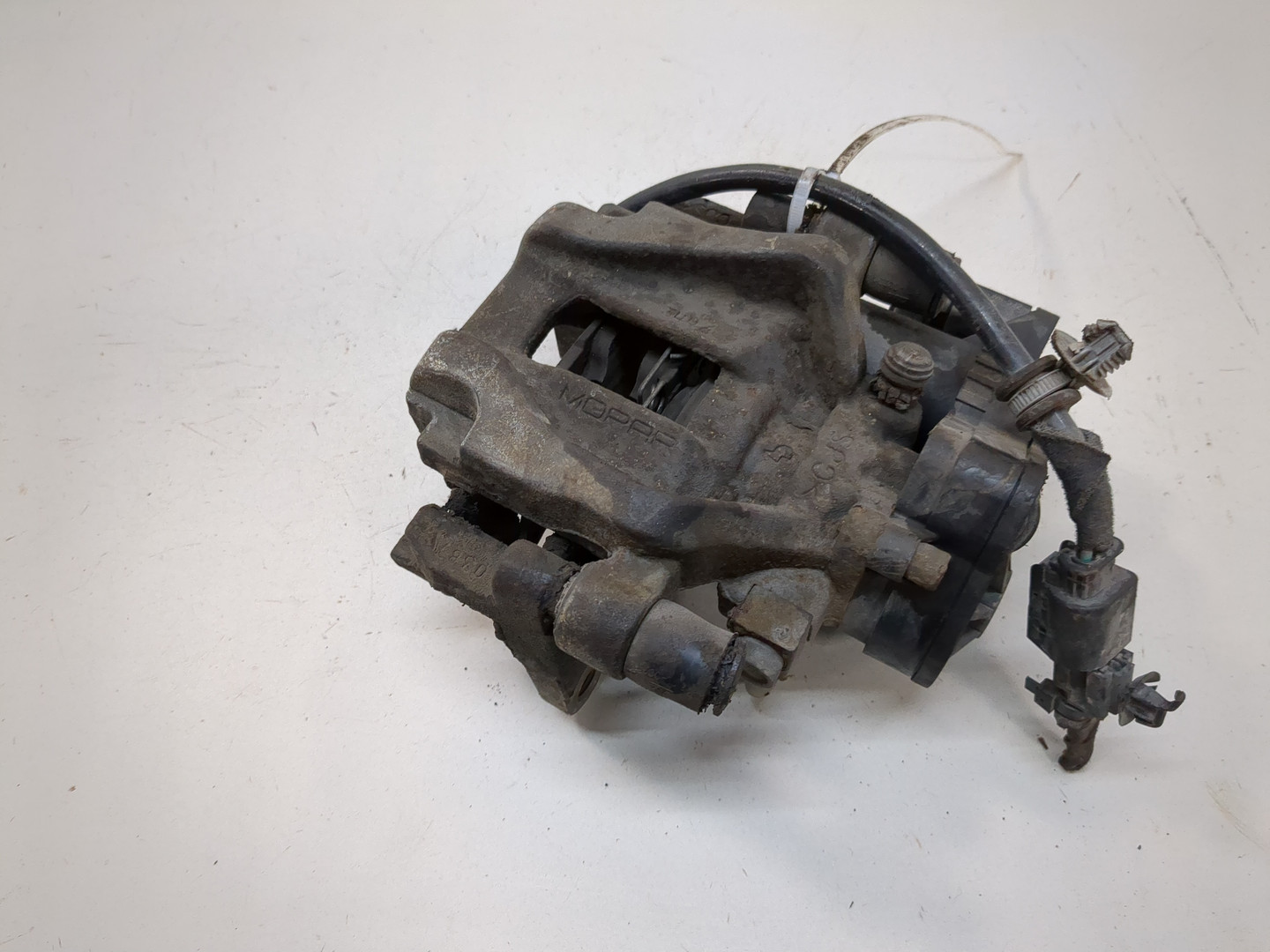 Суппорт задний левый