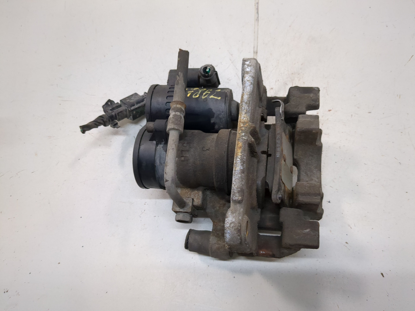 Суппорт задний левый