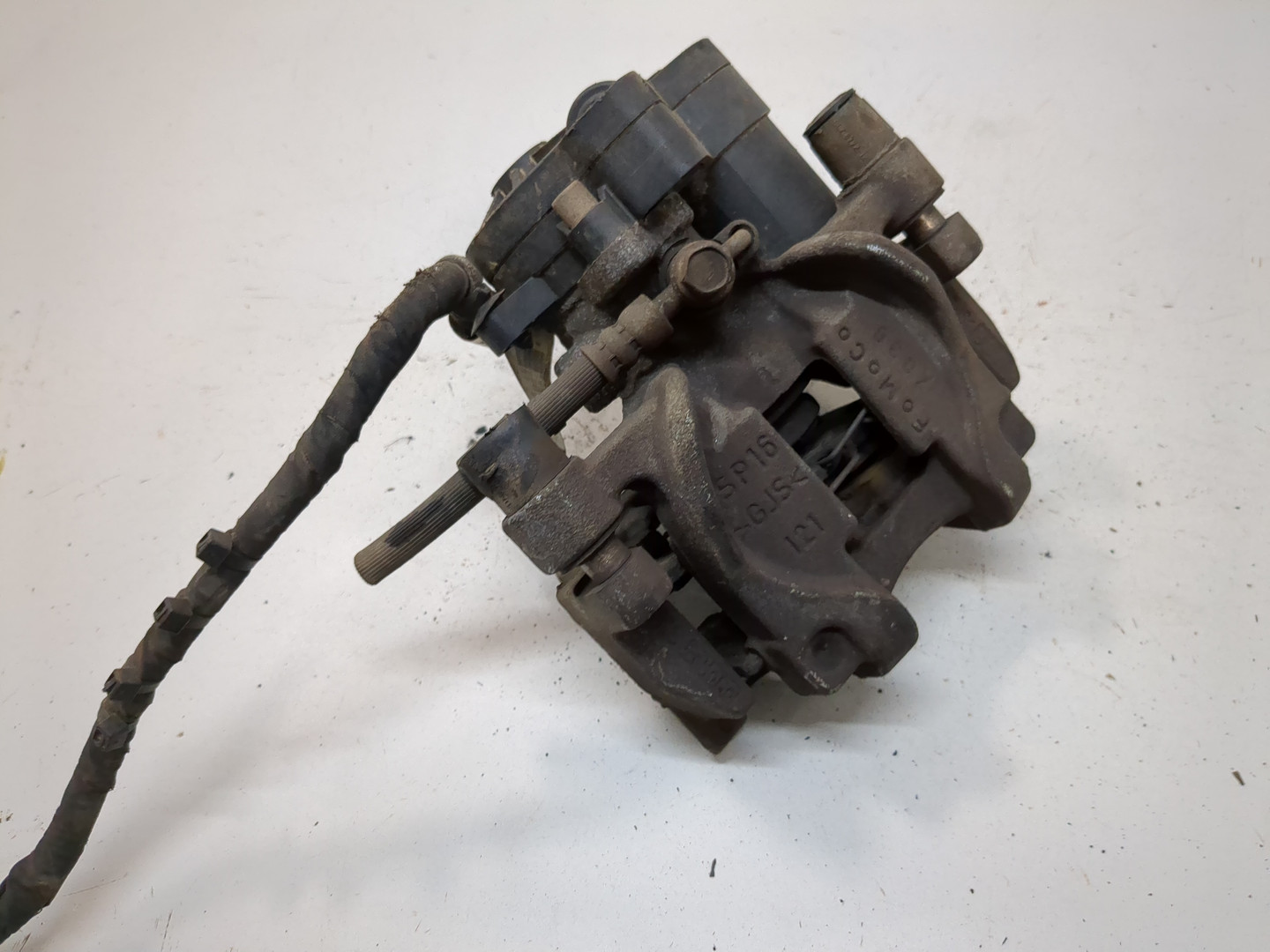 Суппорт задний левый