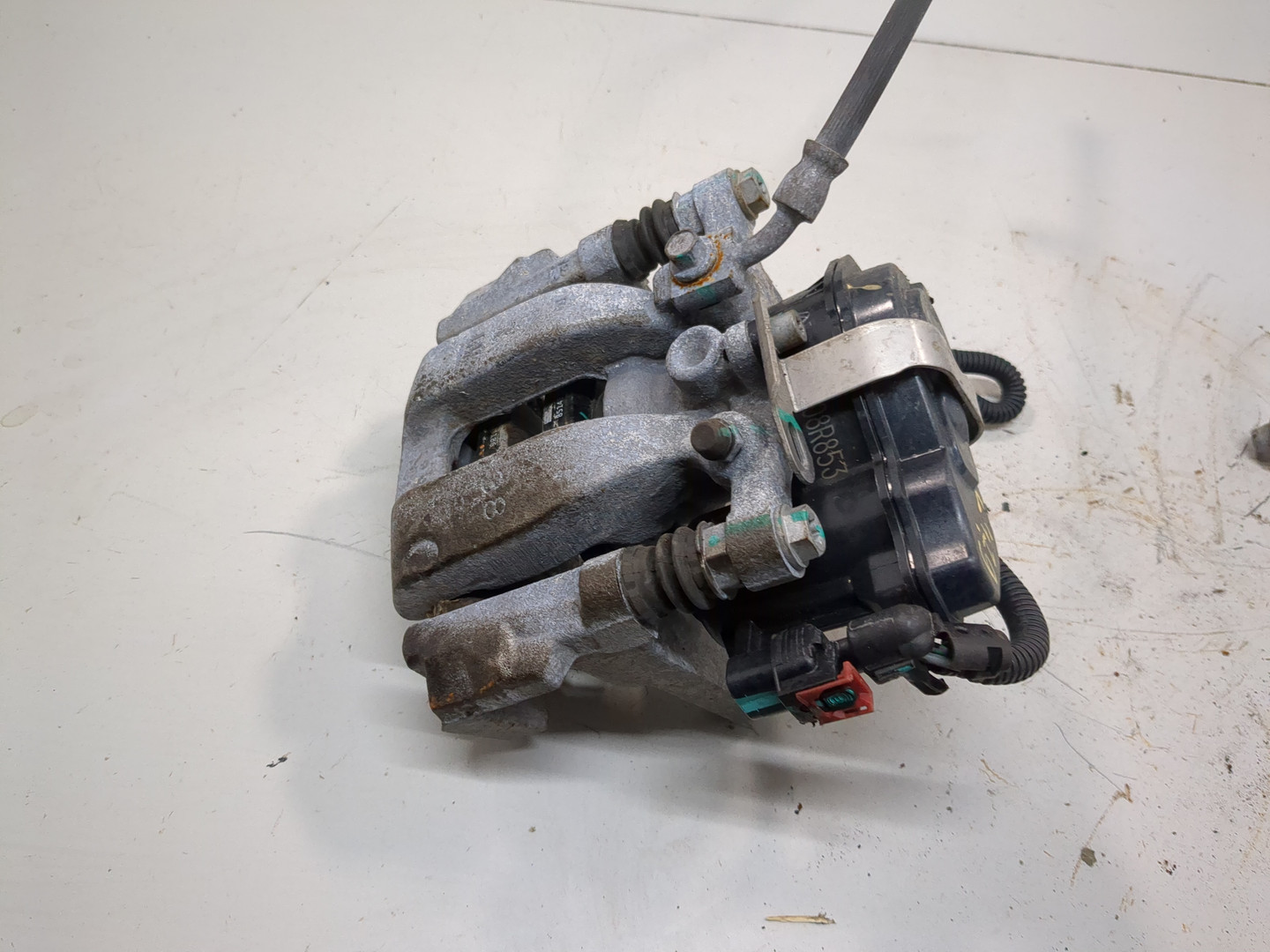 Суппорт задний левый