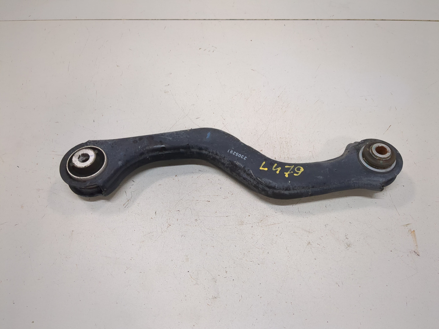 Рычаг задний