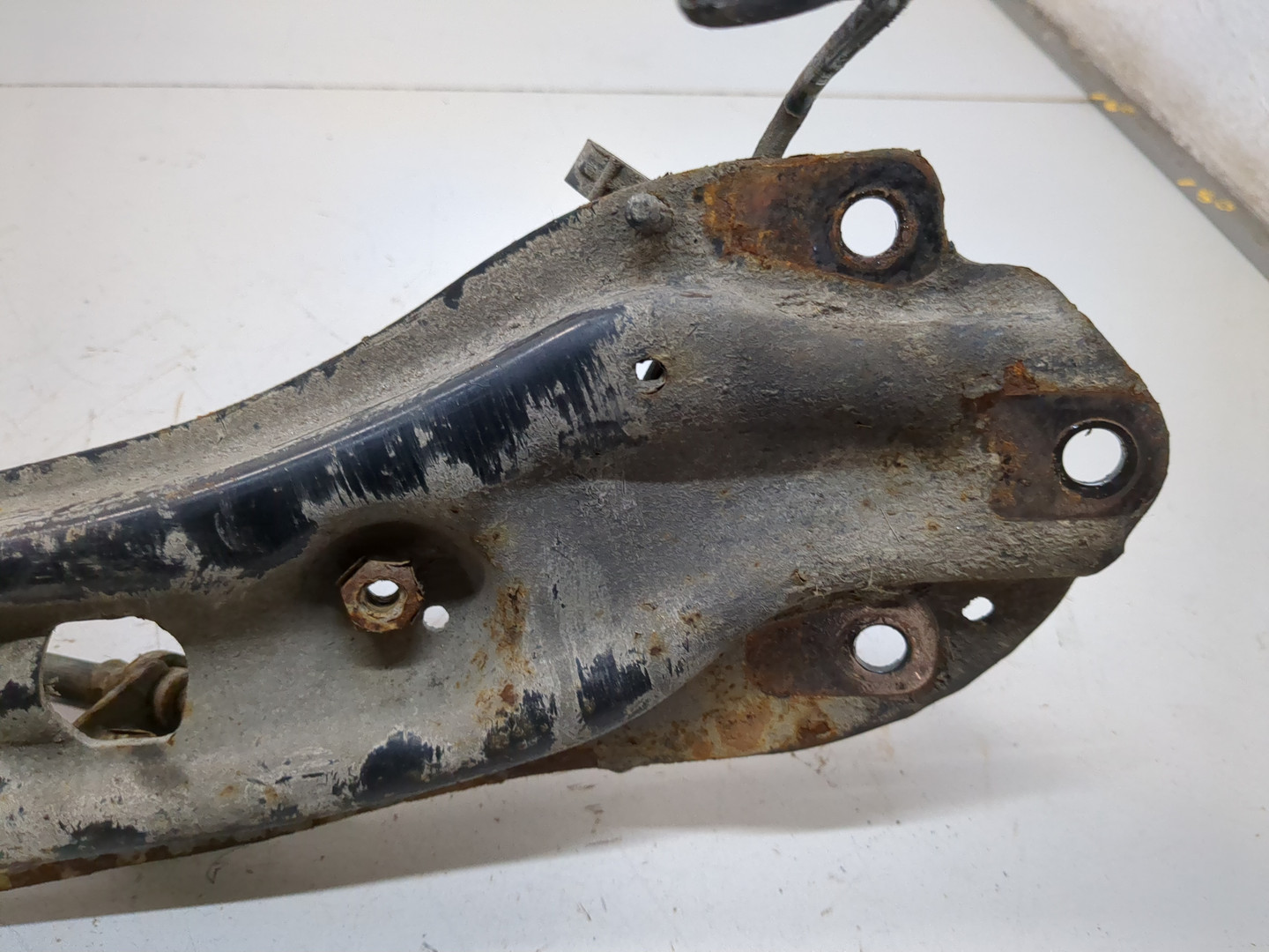 Рычаг задний левый