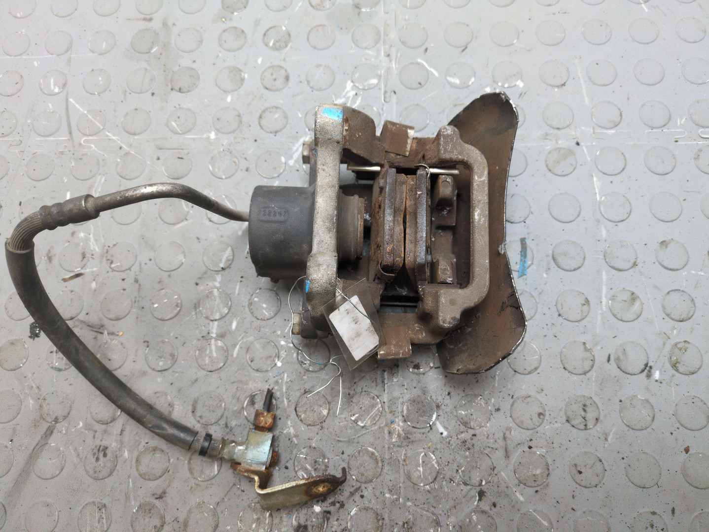 Суппорт задний левый