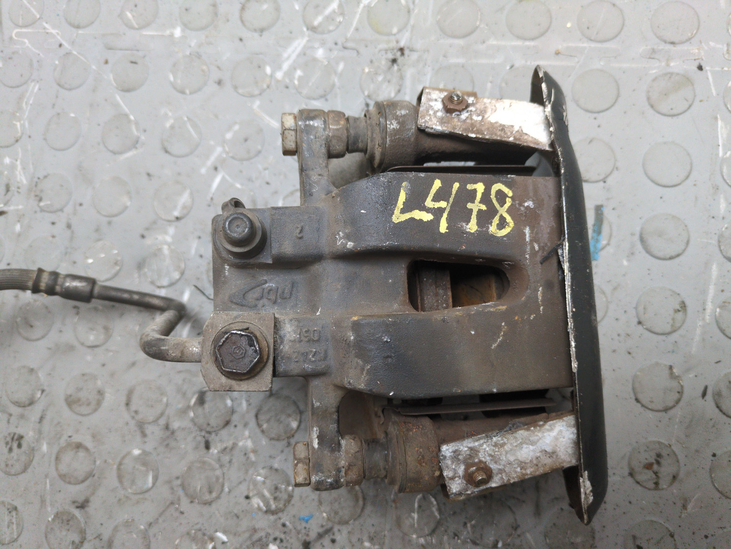 Суппорт задний левый