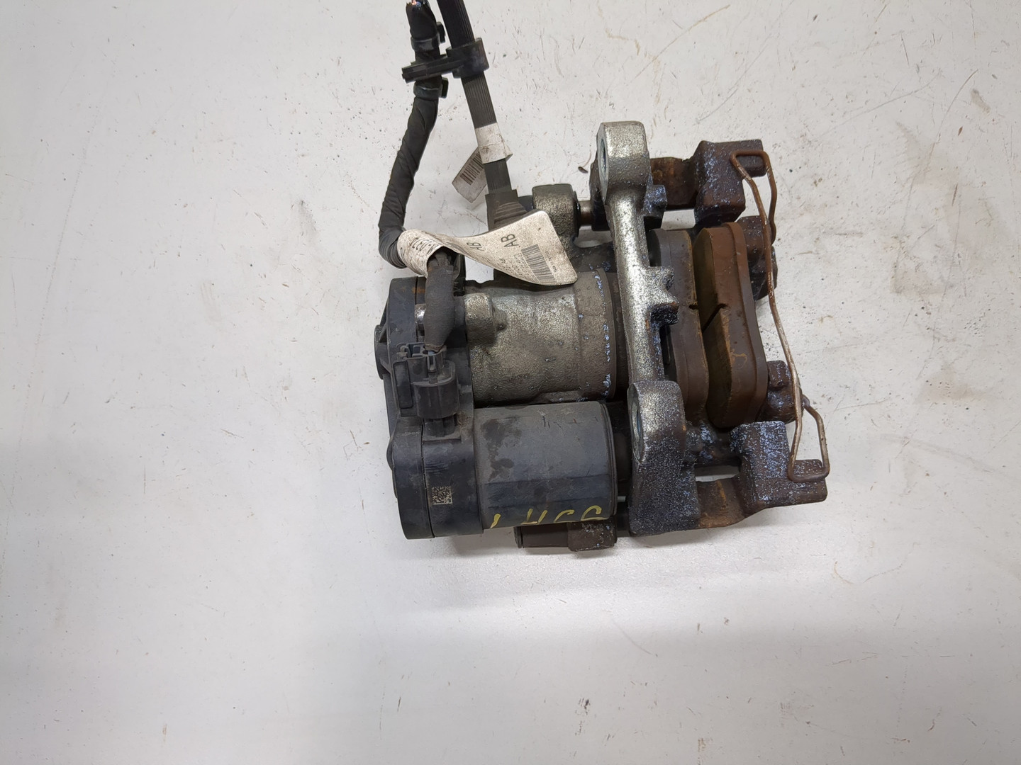 Суппорт задний левый