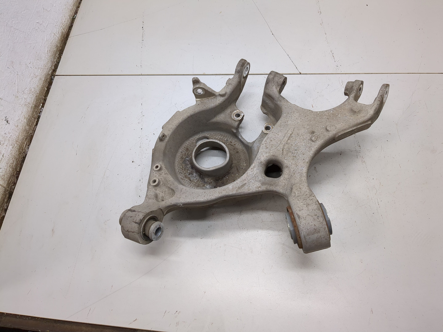 Рычаг задний левый