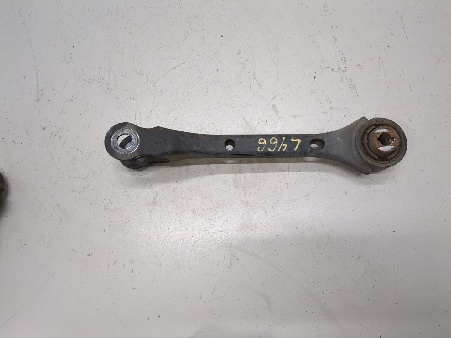 Рычаг задний