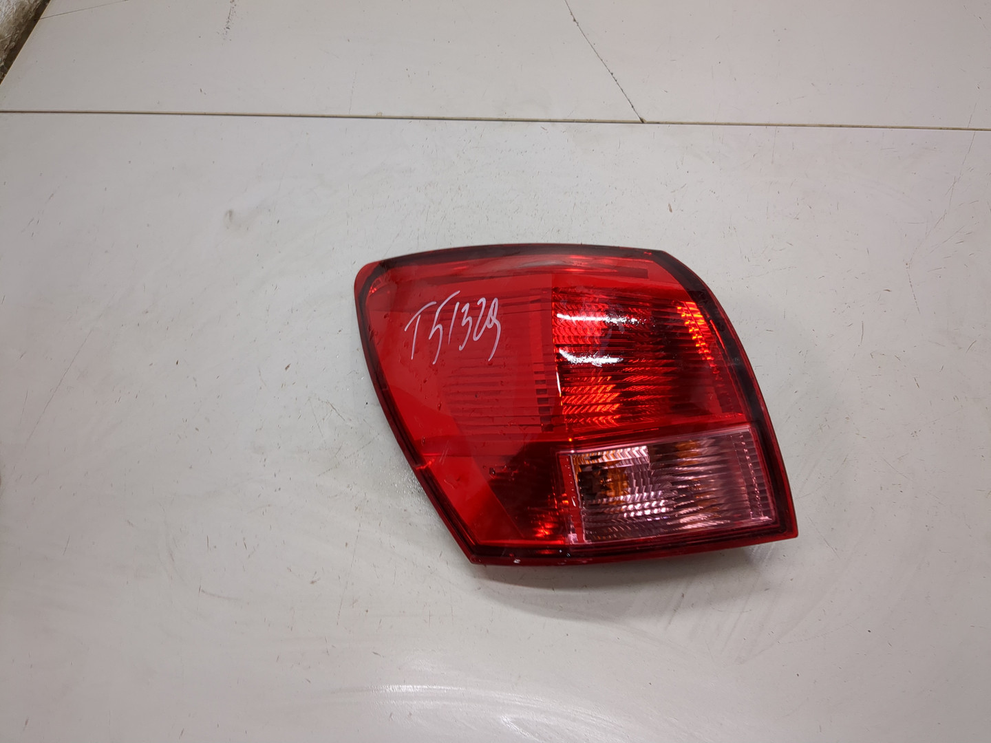 Фонарь задний левый