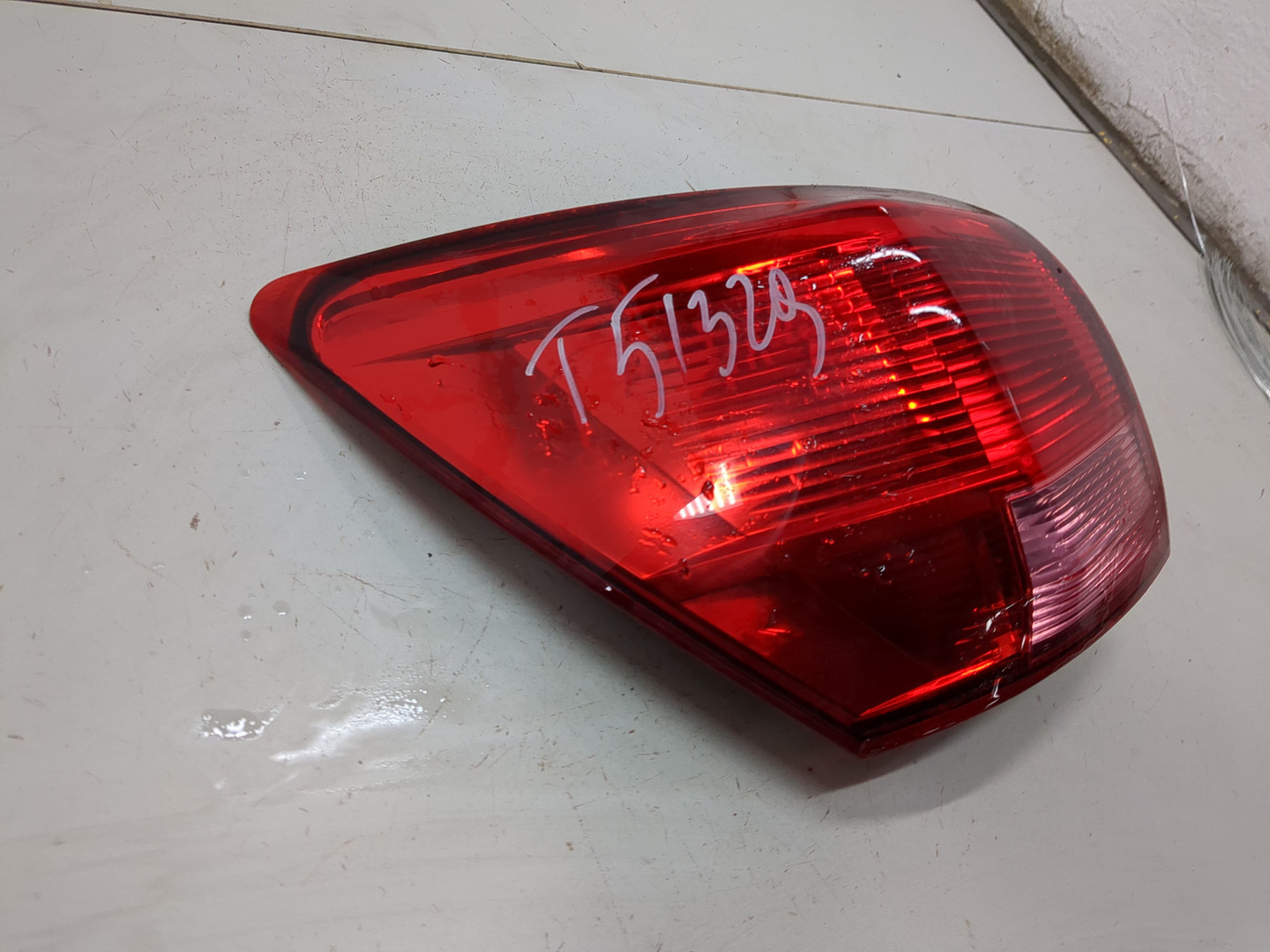 Фонарь задний левый