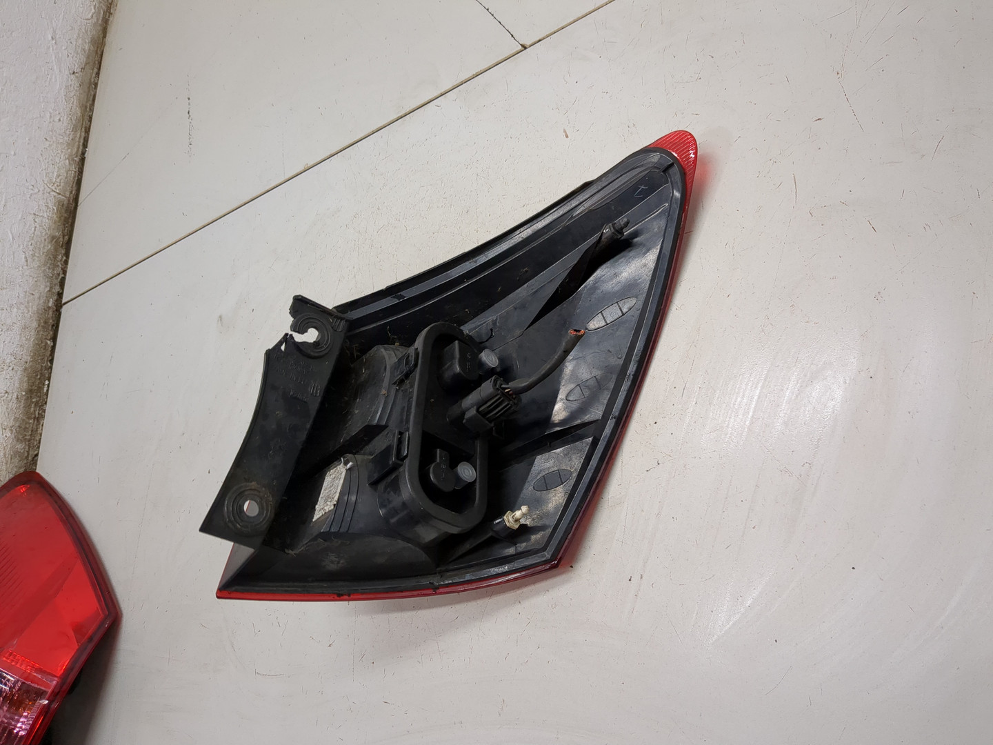 Фонарь задний левый