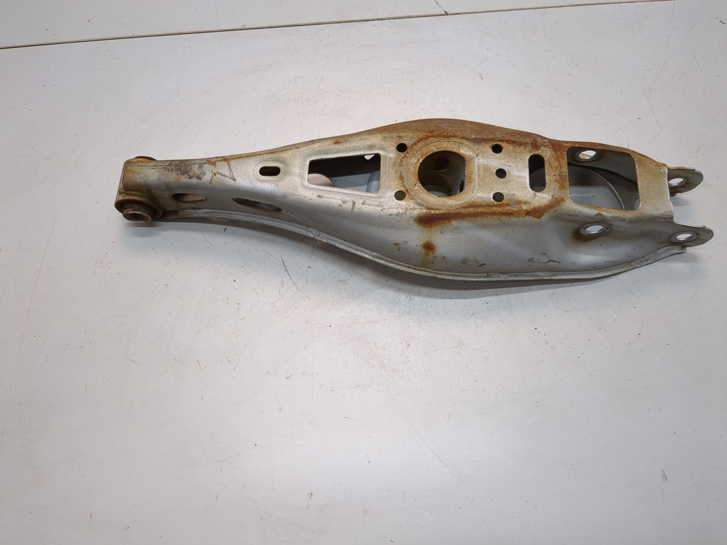 Рычаг задний