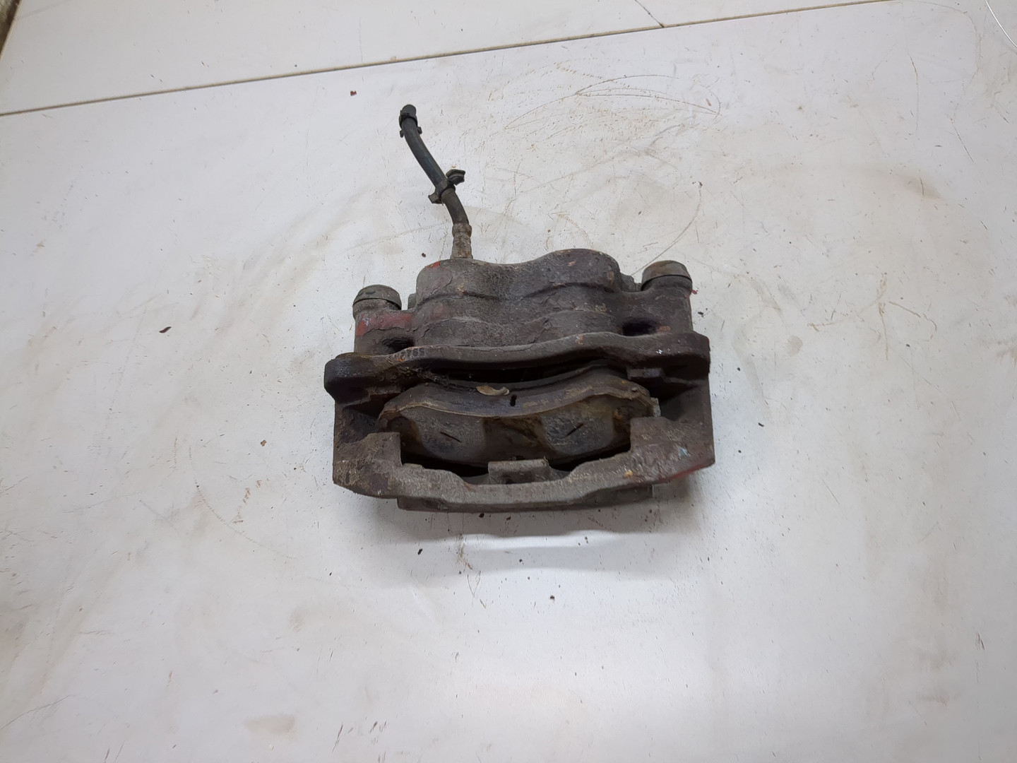 Суппорт передний левый