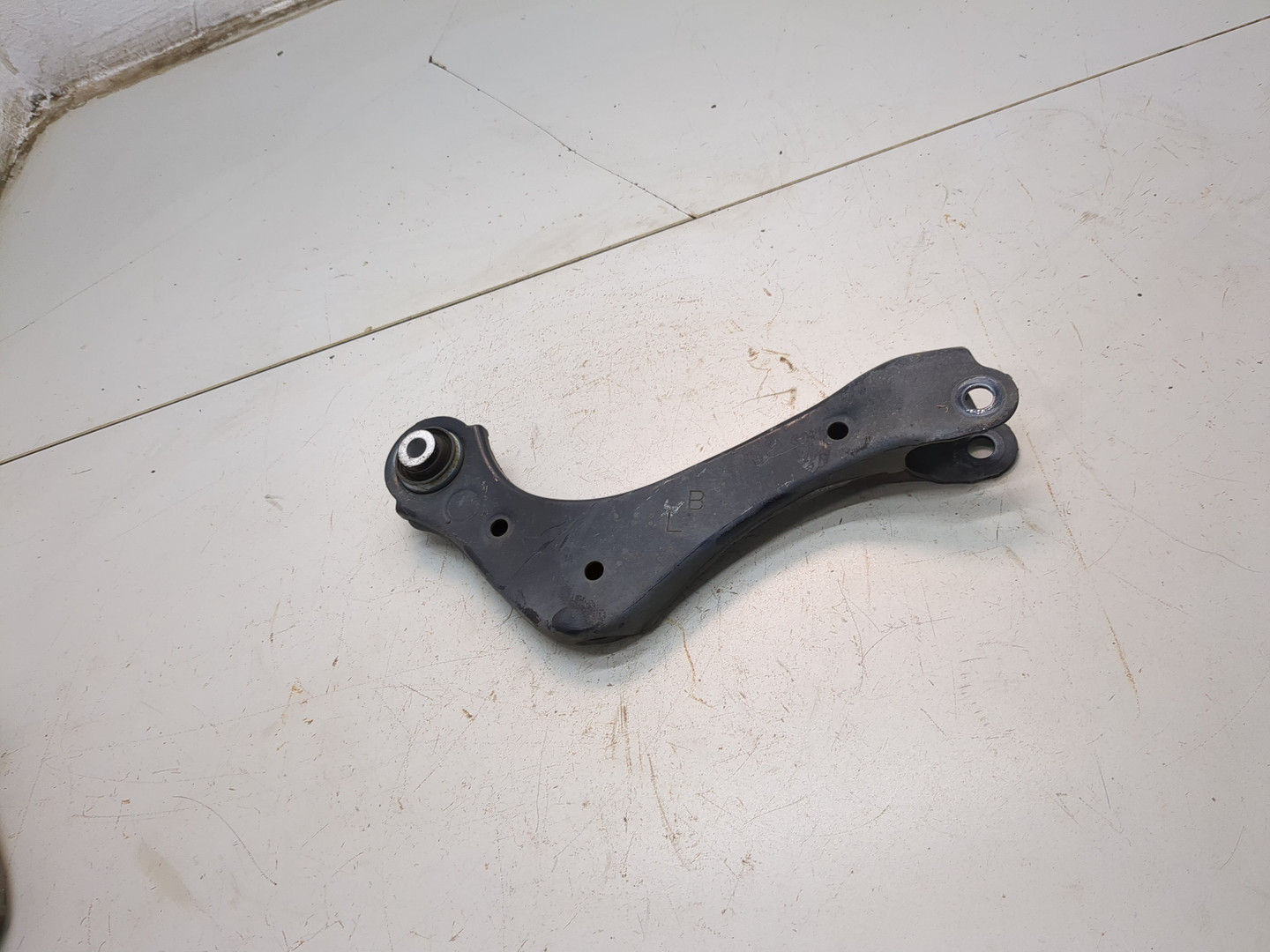 Рычаг задний левый