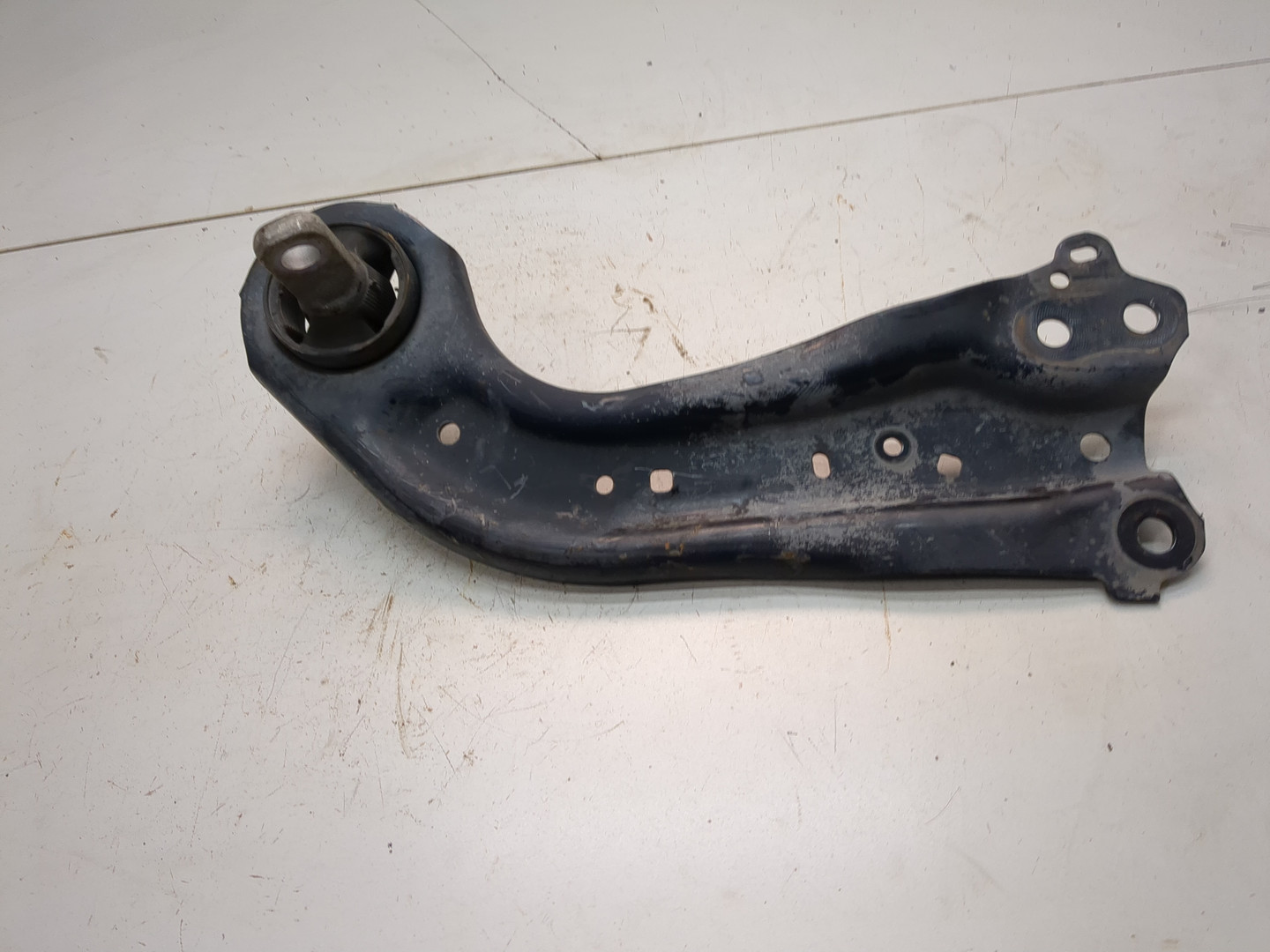 Рычаг задний левый