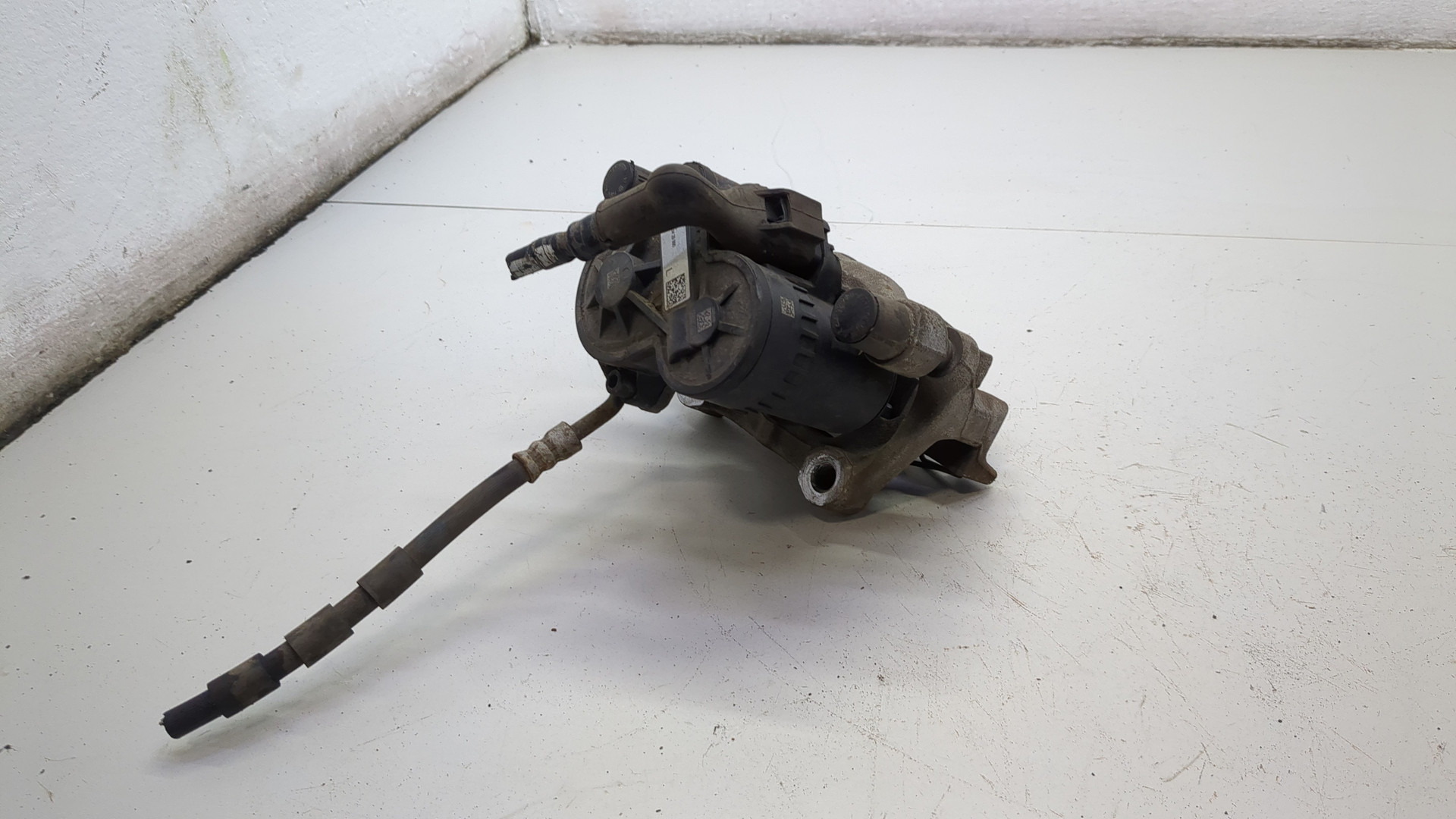 Суппорт задний левый