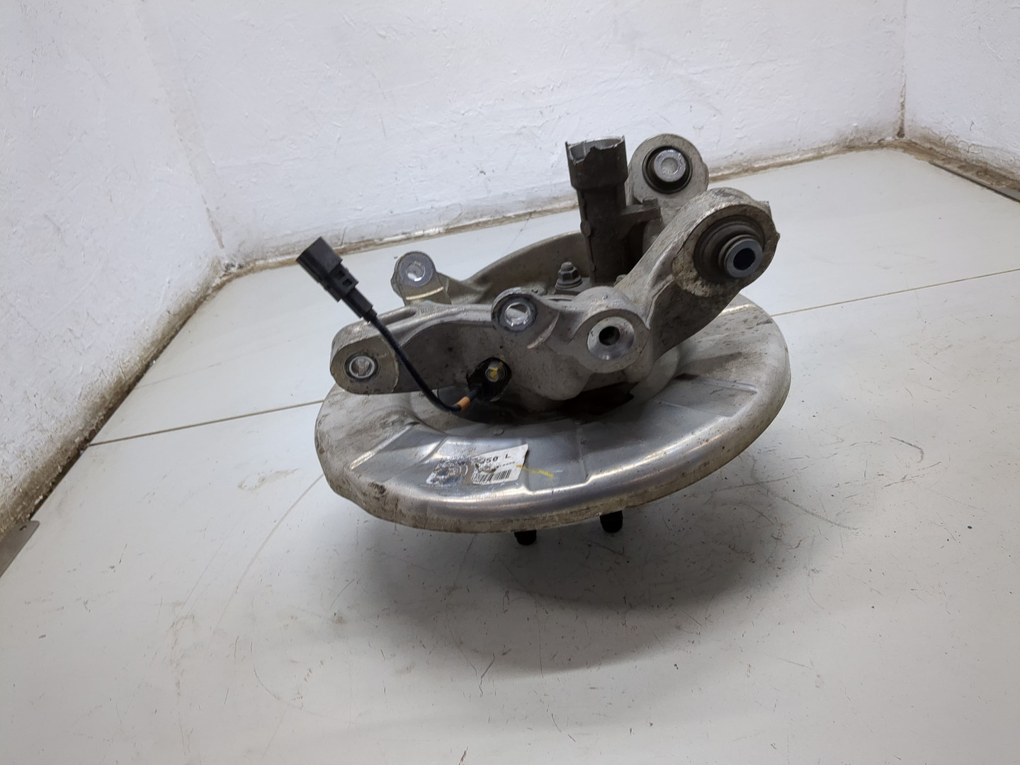 Кулак поворотный задний левый