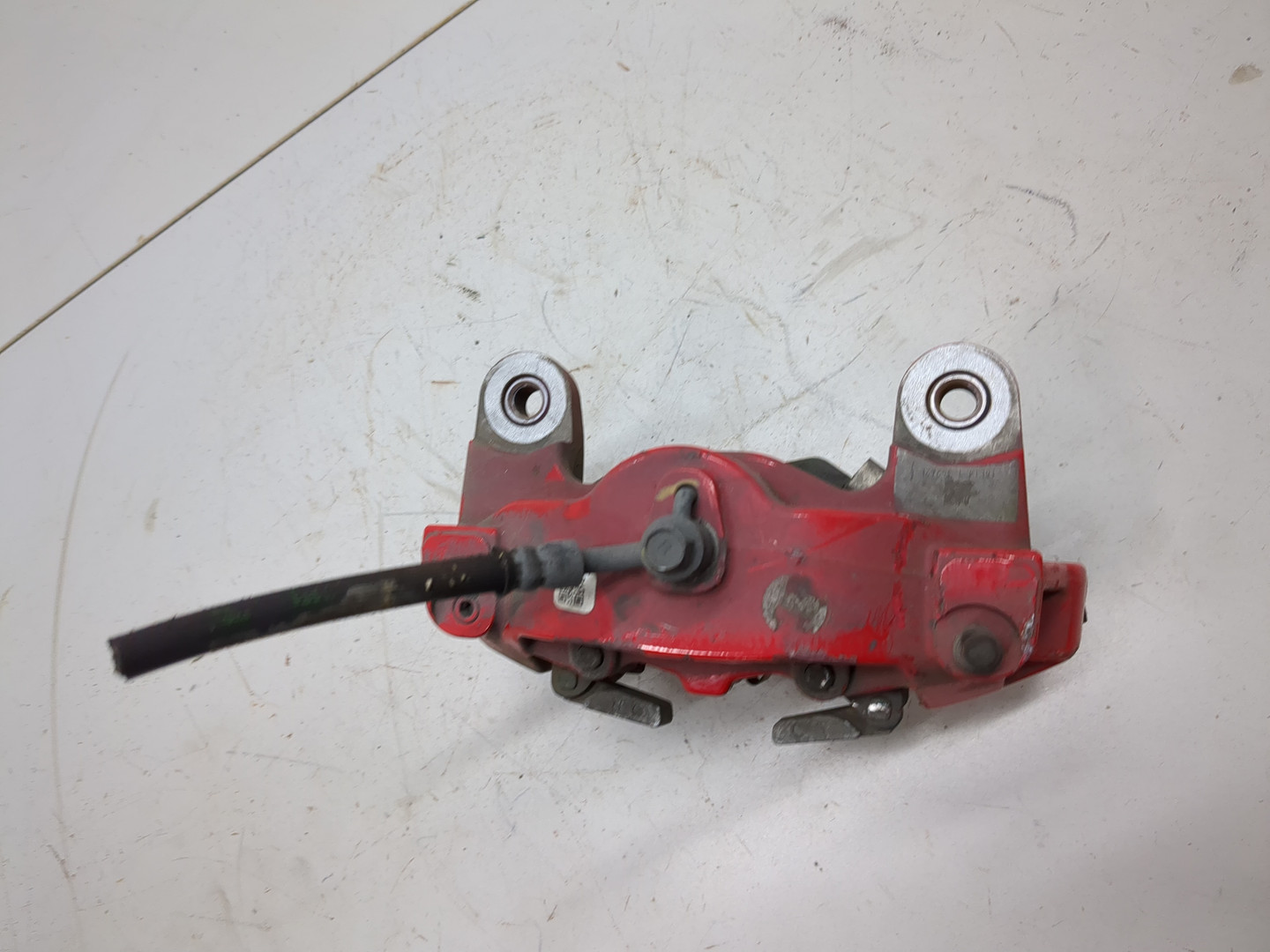 Суппорт задний левый