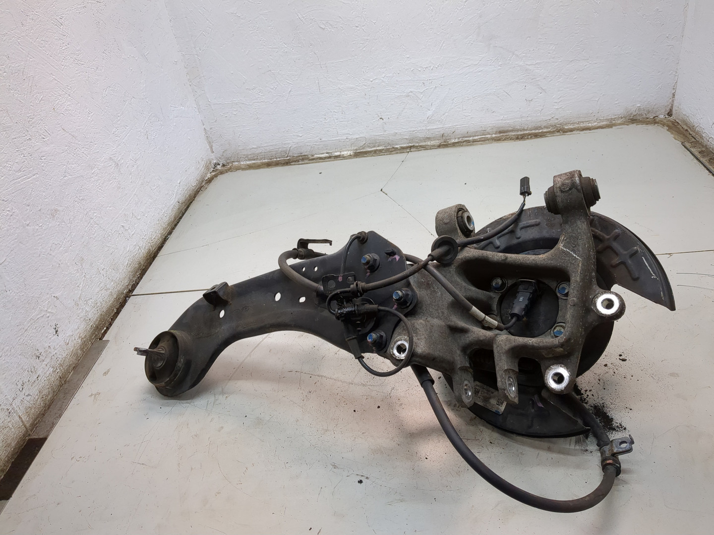 Кулак поворотный задний левый