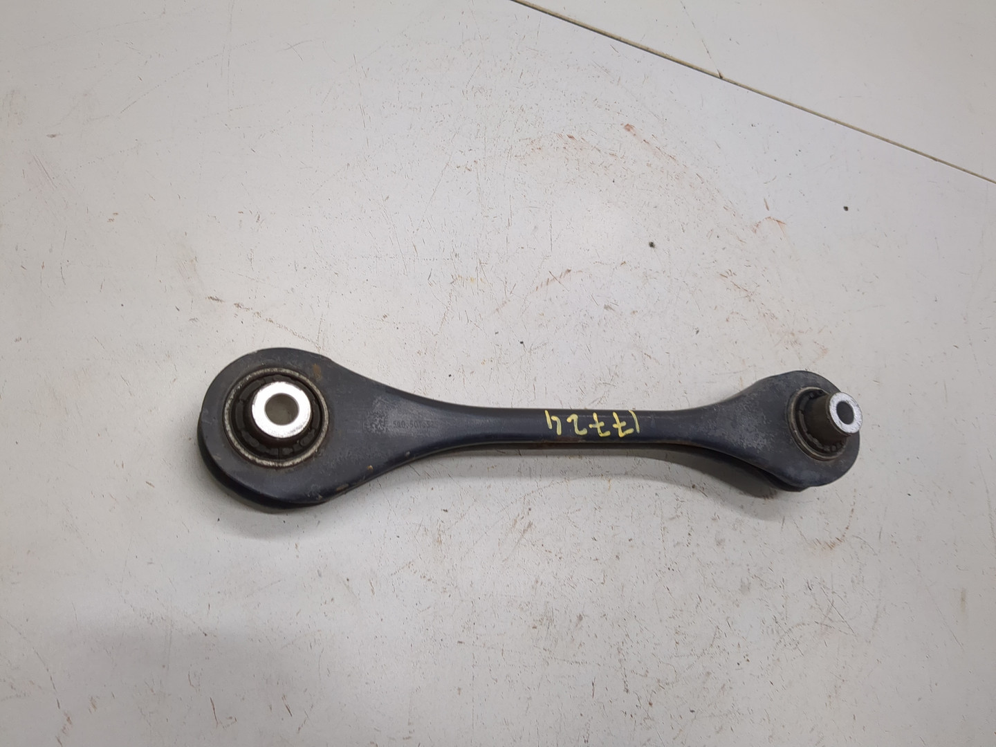 Рычаг задний левый