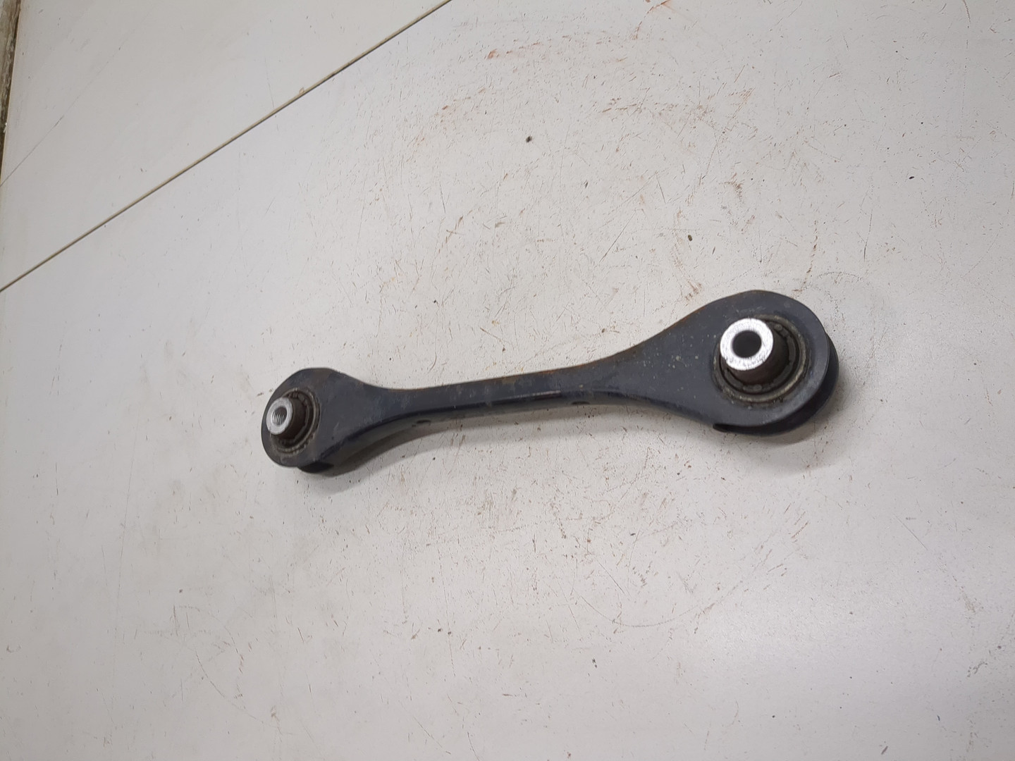 Рычаг задний левый