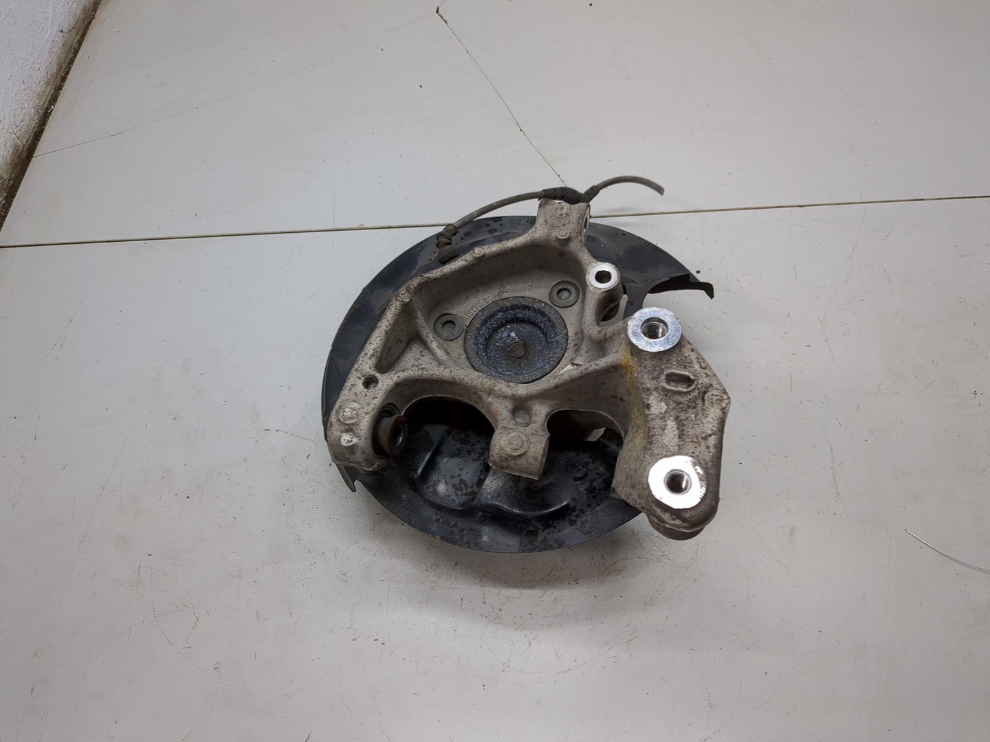 Кулак поворотный задний левый