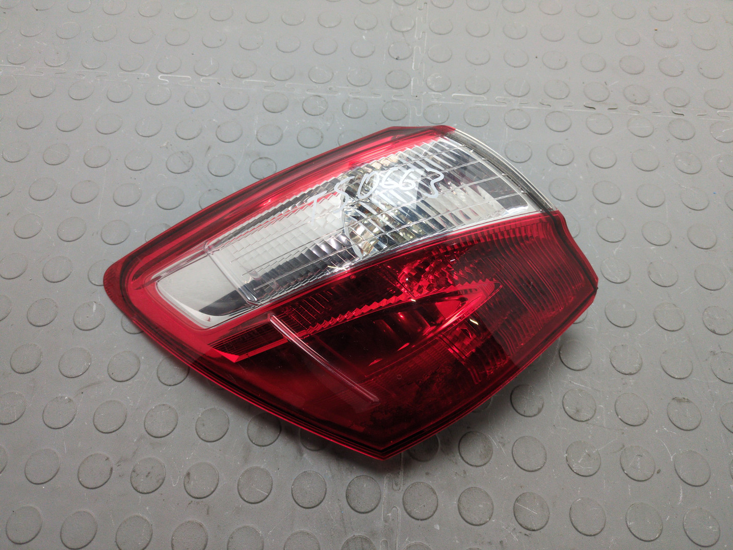 Фонарь задний левый