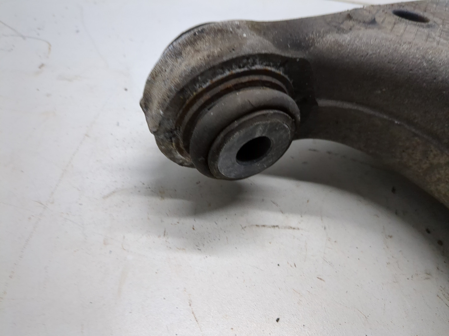 Рычаг задний левый