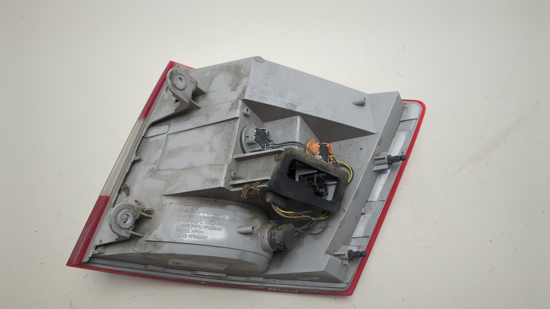 Фонарь задний левый